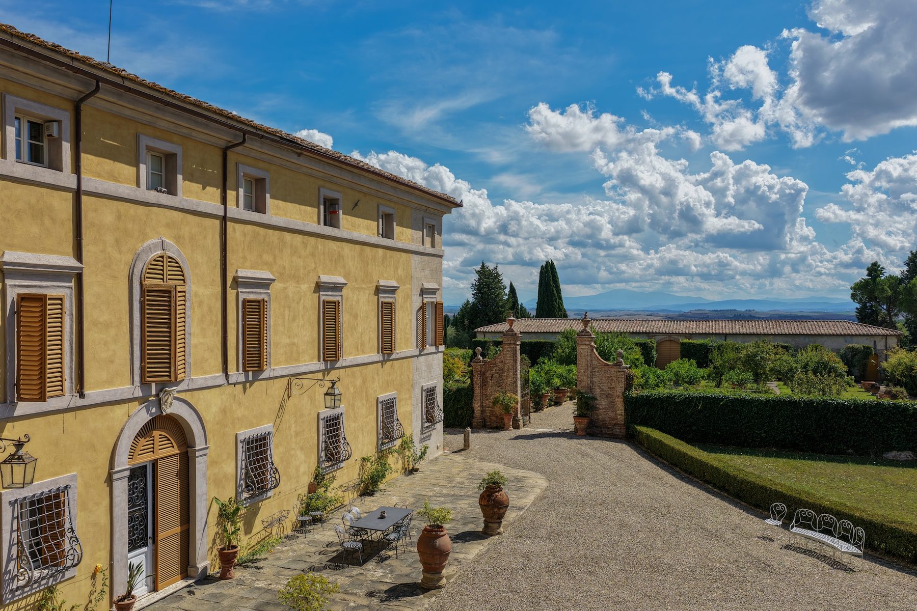 The ochre façade of the 18th-century villa at Tenuta di Montechiaro